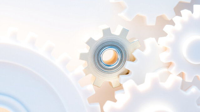 close-up of interlocking white gears with metallic accents showcasing precision engineering