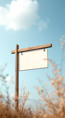 blank white sign on wooden in a field