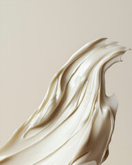Smooth application. Creamy skincare texture, swirling, glistening and elegant on neutral surface.