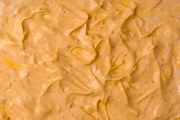 Yellow sauce splashes as a background.