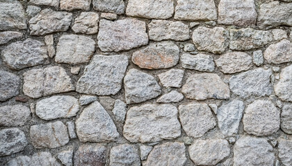 Obraz premium ランダムに配置された石、壁、床、石畳、石の壁、積み重ね、グレー、テクスチャ、壁紙、背景