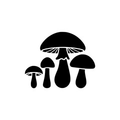 The mushrooms are all black and have a round, bulbous shape. Concept of nature and the beauty of the natural world