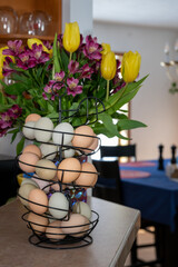 Chicken eggs with spring flowers