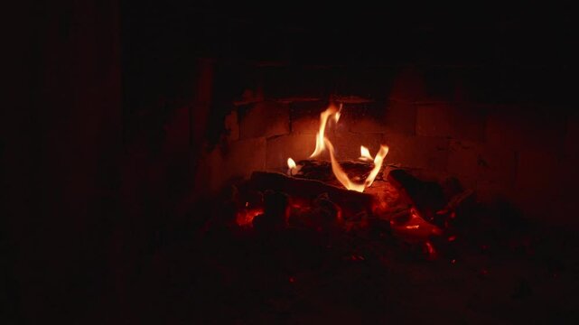 Small Fire Being Blown out and Reigniting