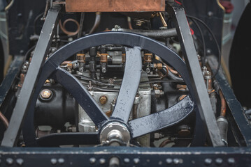 Fototapeta premium Engine on a vintage, veteran car on a show in Brighton, East Sussex, UK