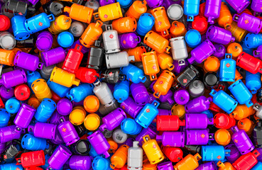 Colored gas cylinders with compressed gas background, wallpaper. 3D rendering