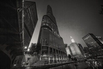Chicago, IL - July 25, 2024: Amazing night view of Downtown Chicago skyscrapers from a cruise along the city river