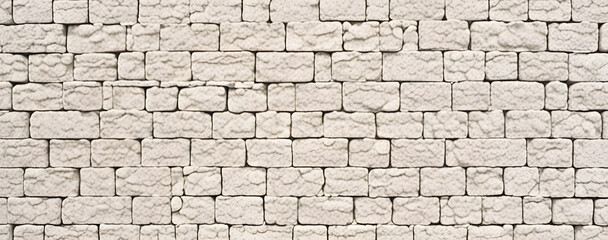 Strukturierte wei&szlig;e Steine in einer Mauerformation