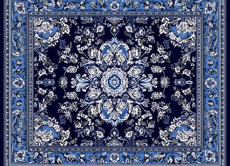 A blue Persian carpet with an intricate floral pattern, with the edge of the design showing the detailed and ornate patterns i 