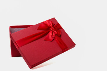 Red box with bow on white background