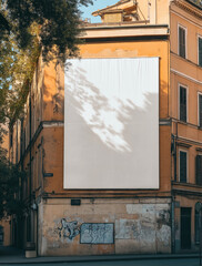 Billboard mockup on Italian outdoor wall. A large blank poster on Mediterranean building in bright day light.