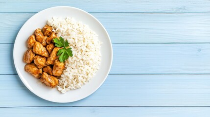 Delicious chicken served with fluffy white rice.