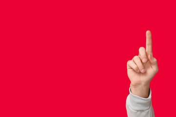 Man pointing at something on red background. Survey concept