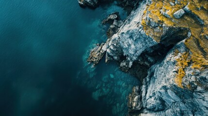 Aerial View of Rocky Coastline and Deep Blue Ocean