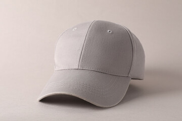 Stylish baseball cap on light grey background. Mockup for design