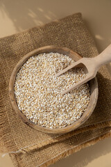 Raw fine ground barley porridge Gluten free cereals. Health gut benefits. Concept of alternative whole spelt grain ingredient. Vegetarian diet recipes. Plant-based lifestyle. Copy space Protein rich