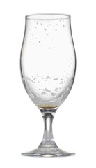 Almost empty glass of beer isolated on white