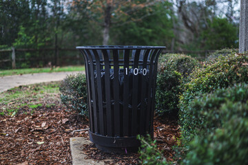 black metal trash can in the park