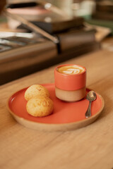 Steaming Elegance: Artisan Coffee Cup in a Modern Café 