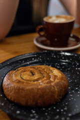 Steaming Elegance: Artisan Coffee Cup in a Modern Café 