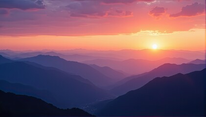Sunset Over Mountain Range with Colorful Sky and Silhouette Peaks