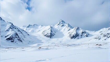Fototapeta premium Majestic Snow-Capped Mountains Under a Bright Blue Sky