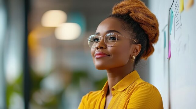 Businesswoman developing innovative marketing strategies in modern office