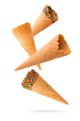Falling empty ice cream cone isolated on white background.