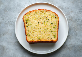 A Single Slice of Broccoli Bread on a White Plate