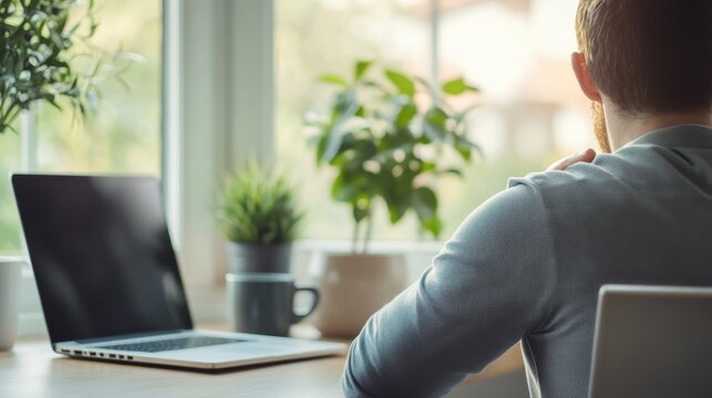 Chronic back pain from bad sitting posture at a desk. Featuring visible discomfort and strain