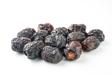 Dates fruit ajwa or kurma ajwa, isolated on white background
