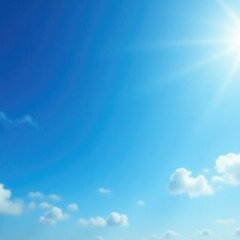 Fototapeta premium Thin wispy clouds are scattered across a clear cerulean sky with sunlight, natural, sun