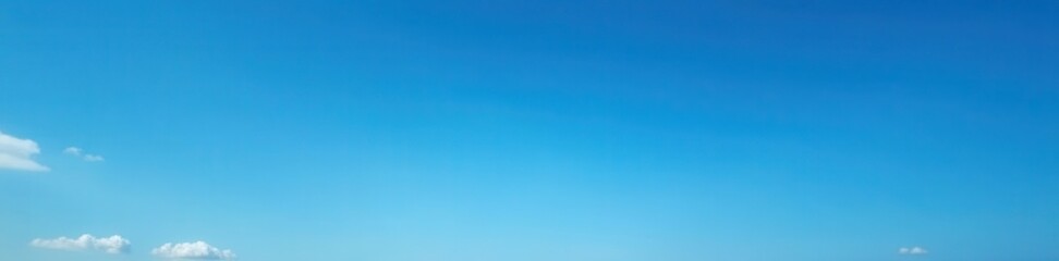 Deep blue gradient sky, subtle wisps of clouds , texture, cloudless, pure