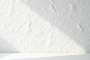 Fototapeta premium White concrete wall, paper-like surface, empty area, light, background