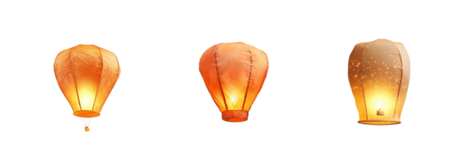 Three Glowing Lanterns Floating Against a Dark Sky at Night