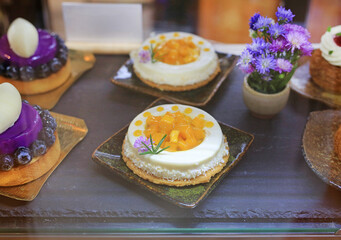 Mango Tart or Mango Pie in the glass cabinet.