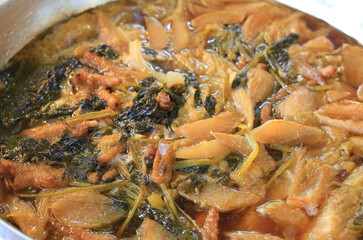 Stewed celery or Tom Jubchai, Thai vegetable stew. Different vegetables cooking with pork.