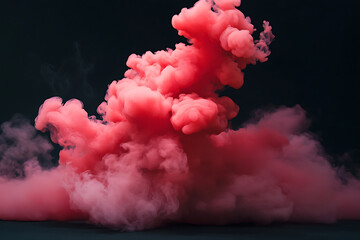 A vibrant explosion of pink smoke against a dark background, creating a dramatic visual effect.