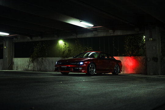 classic Nissan Silvia S14 JDM car in parking garage photoshoot imported car