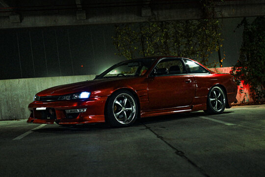 classic Nissan Silvia S14 JDM car in parking garage photoshoot imported car