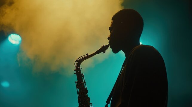 A silhouetted saxophonist performs against a colorful, smoky backdrop, creating a vibrant and dynamic atmosphere in a live music setting.