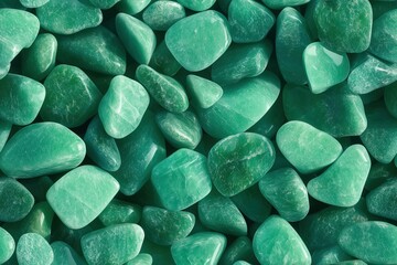 Seamless Green Aventurine collection of polished green aventurine stones, varying in size and shape, with a smooth and shiny surface.