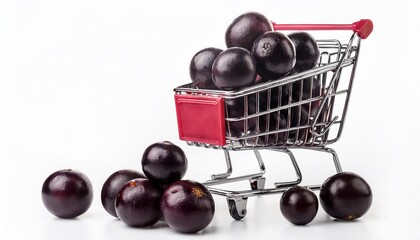 a shopping cart of fresh purple Jabuticaba fruit on a white background isolated