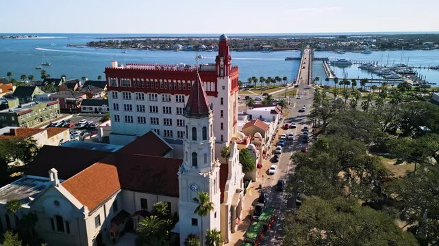 Flying through historic St. Augustine, Florida, East over Plaza de la Constitucion and the Bridge of Lions at mid-morning