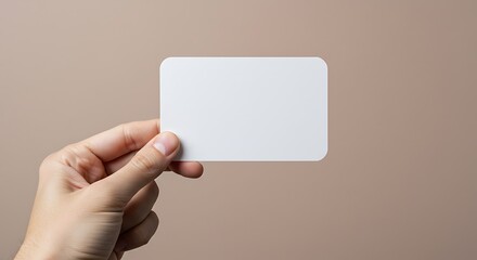 Hand hold blank white card mockup with rounded corners. Plain call-card mock up template holding arm. 