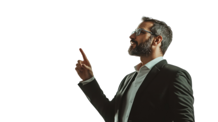A confident businessman gestures while presenting ideas, showcasing a mix of professionalism and engagement in a corporate environment.
