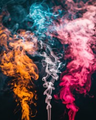 Colorful smoke swirls in vibrant hues of orange, blue, pink, and white against a dark background, creating an artistic and dynamic visual effect.