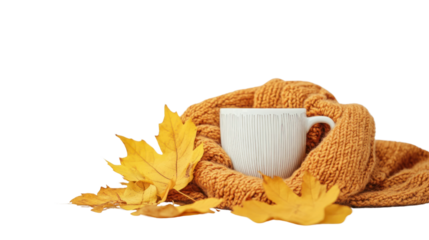 A cozy scene featuring a white cup wrapped in a warm, orange scarf surrounded by autumn leaves, perfect for evoking comfort in fall.