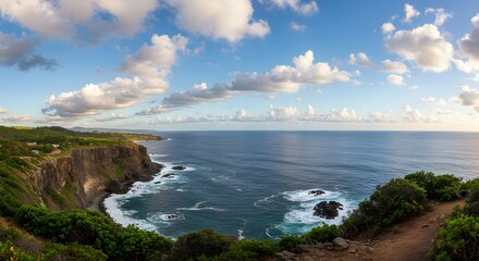 Naklejka premium Coastal Cliffside View with Ocean Waves and Beautiful Blue Sky