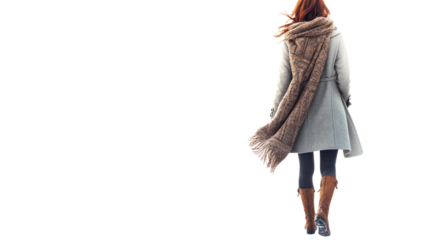 A woman walking away in a stylish outfit, wrapped in a cozy scarf, radiating modern fashion sensibility and confidence in her daily life.